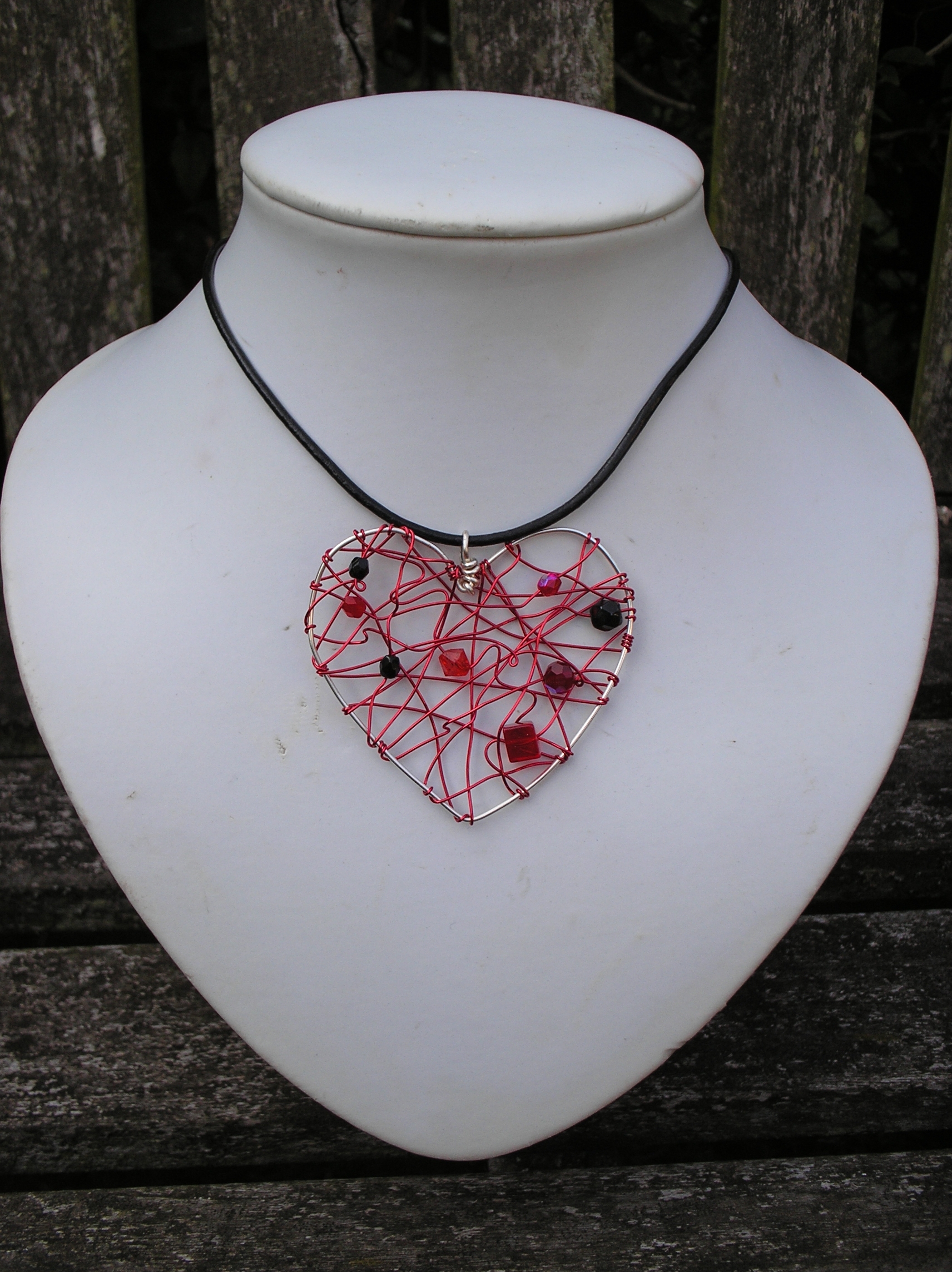 Heart and red wire pendant